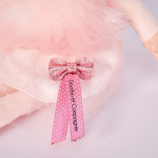 poupée blonde avec chignon et couronne, boléro à poil rose et tutu Jolijou